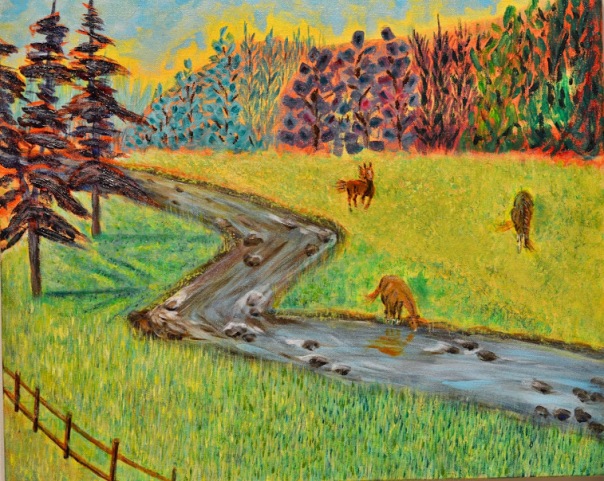 Three horses in a ranch with stream